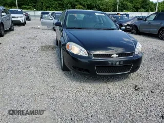 2014 Chevrolet Impala LTZ with VIN 2G1WC5E33E1164638, listed as a Copart auction lot 58699635 with 189,636 mi miles and Salvage title. Bid and sale history available at DreamBid. Image 13.