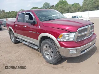 2011 Ram 1500 Big Horn z VIN 1D7RV1CT4BS600232, wystawiony jako IAAI lot #42353204 z przebiegiem 97 086 mil mil oraz . Historia ofert i sprzedaży dostępna na DreamBid. Obrazek 1.