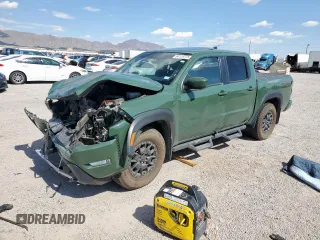 2023 Nissan Frontier Pro-4X with VIN 1N6ED1EK0PN670488, listed as a Copart auction lot 64129775 with 15,294 mi miles and Salvage title. Bid and sale history available at DreamBid. Image 1.