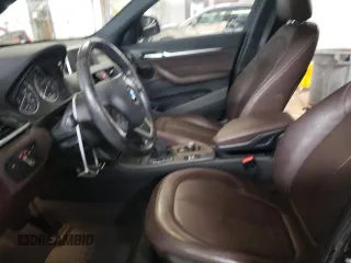 2017 BMW X1 xDrive28i with VIN WBXHT3C34H5F87048, listed as a Copart auction lot 67545012 with 76,666 mi miles. Bid and sale history available at carsss.com. Image 7.