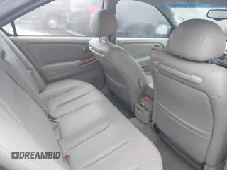 2002 Infiniti I35 Luxury with VIN JNKDA31A32T018726, listed as a IAAI auction lot 41784774 with 139,008 mi miles. Bid and sale history available at carsss.com. Image 8.