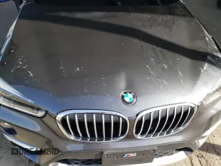 2017 BMW X1 sDrive28i with VIN WBXHU7C34HP924730, listed as a Copart auction lot 52245005 with 0 mi miles and Salvage Title. Bid and sale history available at carsss.com. Image 13.