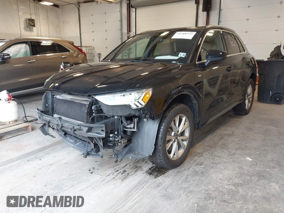 2021 Audi Q3 S line Premium Plus with VIN WA1EECF32M1054629, listed as a IAAI auction lot 41588322 with 33,385 mi miles and . Bid and sale history available at DreamBid. Image 2.