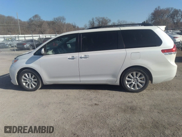 2014 Toyota Sienna XLE with VIN 5TDYK3DC3ES491381, listed as a IAAI auction lot 41803362 with 253,940 mi miles. Bid and sale history available at carsss.com. Image 14.