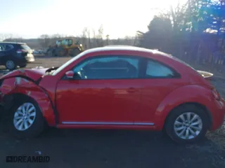 2019 Volkswagen Beetle S with VIN 3VWFD7AT1KM712384, listed as a IAAI auction lot 41505127 with 49,527 mi miles. Bid and sale history available at carsss.com. Image 14.