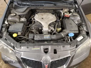 2009 Pontiac G8 z VIN 6G2ER57739L205634, wystawiony jako Copart lot #58935145 z przebiegiem 181 490 mil mil oraz Czysty tytuł • Clean title. Historia ofert i sprzedaży dostępna na DreamBid. Obrazek 11.
