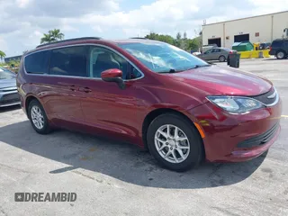 2020 Chrysler Voyager LXI with VIN 2C4RC1DGXLR181940, listed as a IAAI auction lot 41812620 with 63,152 mi miles. Bid and sale history available at carsss.com. Image 1.
