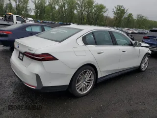 2024 BMW 5 Series 530i xDrive with VIN WBA53FJ01RCP97253, listed as a Copart auction lot 50888795 with 11,985 mi miles and Salvage title. Bid and sale history available at DreamBid. Image 3.