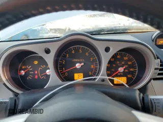 2008 Nissan 350Z Touring z VIN JN1BZ34E18M750200, wystawiony jako Copart lot #87947755 z przebiegiem 185 343 mil mil oraz Szkoda całkowita • Salvage title. Historia ofert i sprzedaży dostępna na DreamBid. Obrazek 9.