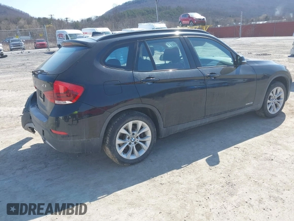 2013 BMW X1 xDrive28i with VIN WBAVL1C59DVR87469, listed as a IAAI auction lot 41775333 with 124,220 mi miles. Bid and sale history available at carsss.com. Image 4.