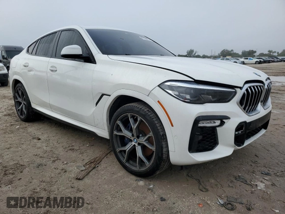 2021 BMW X6 sDrive40i z VIN 5UXCY4C08M9F34312, wystawiony jako Copart lot #87206474 z przebiegiem 67 851 mil mil oraz Czysty tytuł • Clean title. Historia ofert i sprzedaży dostępna na DreamBid. Obrazek 4.