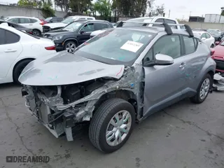2020 Toyota C-HR LE with VIN JTNKHMBX8L1075302, listed as a IAAI auction lot 41892289 with 51,643 mi miles. Bid and sale history available at carsss.com. Image 2.