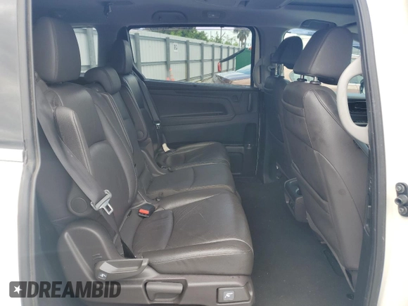2018 Honda Odyssey Elite z VIN 5FNRL6H9XJB064148, wystawiony jako Copart lot #56214025 z przebiegiem 117 627 mil mil oraz Szkoda całkowita • Salvage title. Historia ofert i sprzedaży dostępna na DreamBid. Obrazek 11.