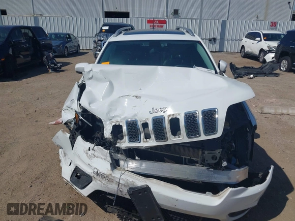 2019 Jeep Cherokee Latitude Plus with VIN 1C4PJLLB4KD455861, listed as a IAAI auction lot 41975695 with 104,413 mi miles. Bid and sale history available at carsss.com. Image 12.