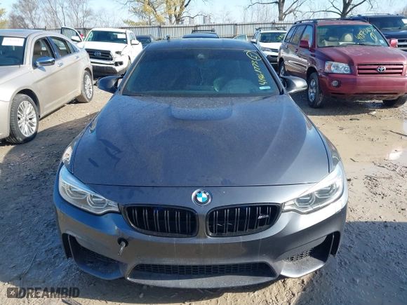 2015 BMW M4 with VIN WBS3R9C57FK334921, listed as a IAAI auction lot 41869773 with 107,058 mi miles. Bid and sale history available at carsss.com. Image 12.