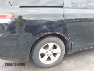 2014 Toyota Sienna LE AAS with VIN 5TDKK3DC0ES487830, listed as a IAAI auction lot 42216342 with 155,973 mi miles and . Bid and sale history available at carsss.com. Image 6.