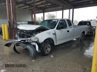 2002 Ford F-150 XL with VIN 1FTRX17W92NB92785, listed as a Copart auction lot 63397614 with 225,256 mi miles and Salvage title. Bid and sale history available at DreamBid. Image 1.
