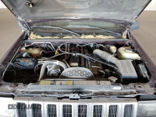 1995 Jeep Grand Cherokee Laredo with VIN 1J4GZ58S1SC704775, listed as a Copart auction lot 87556535 with 266,365 mi miles and Salvage Title. Bid and sale history available at carsss.com. Image 12.
