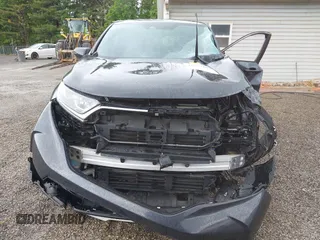 2018 Honda CR-V EX z VIN 7FARW2H50JE094132, wystawiony jako IAAI lot #42337889 z przebiegiem 59 273 mil mil oraz . Historia ofert i sprzedaży dostępna na DreamBid. Obrazek 13.