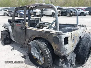 2014 Jeep Wrangler Sport с VIN 1C4AJWAG0EL217280, выставлен на аукционе IAAI как лот 42154964 с пробегом Не указан миль и . История ставок и продаж доступна на DreamBid. Изображение 3.