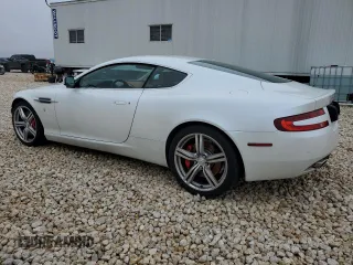 2009 Aston Martin DB9 z VIN SCFAD01E59GA10938, wystawiony jako Copart lot #39463124 z przebiegiem 19 856 mil mil oraz . Historia ofert i sprzedaży dostępna na DreamBid. Obrazek 2.