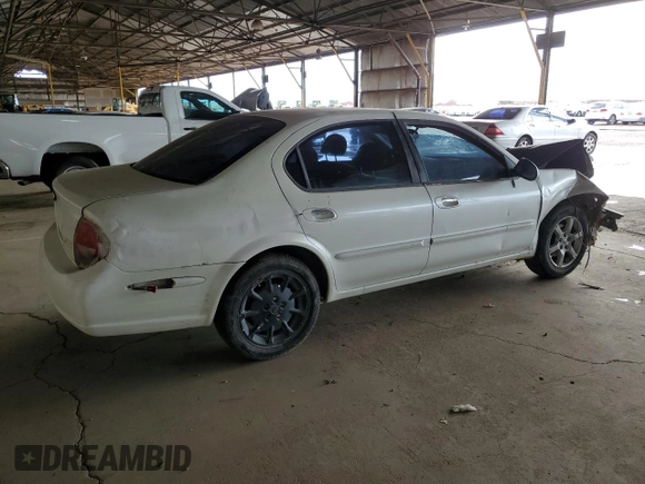2001 Nissan Maxima GXE with VIN JN1CA31D41T809212, listed as a Copart auction lot 57845405 with 244,502 mi miles and Salvage title. Bid and sale history available at DreamBid. Image 3.