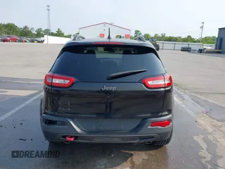 2015 Jeep Cherokee Trailhawk with VIN 1C4PJMBS6FW786622, listed as a IAAI auction lot 42403215 with 148,205 mi miles and . Bid and sale history available at DreamBid. Image 16.