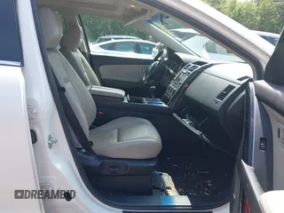 2014 Mazda CX-9 Touring z VIN JM3TB3CV7E0426900, wystawiony jako IAAI lot #42796725 z przebiegiem Nie podano mil oraz . Historia ofert i sprzedaży dostępna na DreamBid. Obrazek 5.