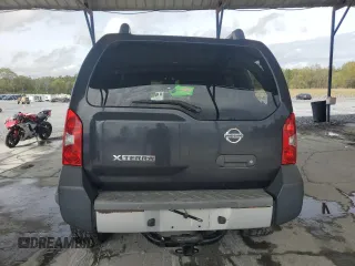 2014 Nissan Xterra X with VIN 5N1AN0NW3EN805368, listed as a Copart auction lot 51140885 with 120,104 mi miles and Salvage Title. Bid and sale history available at DreamBid. Image 6.