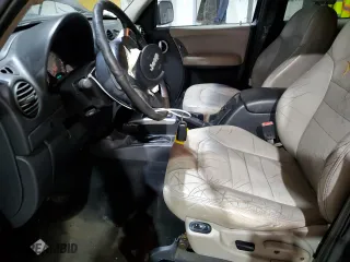 2004 Jeep Liberty Limited with VIN 1J4GL58K84W177787, listed as a Copart auction lot 88910535 with 143,779 mi miles and Salvage Title. Bid and sale history available at carsss.com. Image 7.