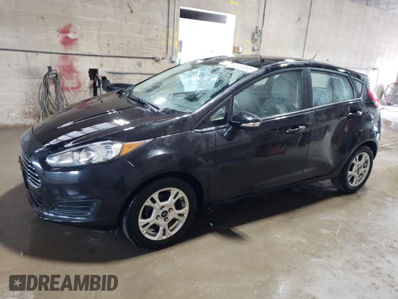 2014 Ford Fiesta SE z VIN 3FADP4EJ7EM145326, wystawiony jako Copart lot #62030855 z przebiegiem 83 625 mil mil oraz Czysty tytuł • Clean title. Historia ofert i sprzedaży dostępna na DreamBid. Obrazek 1.