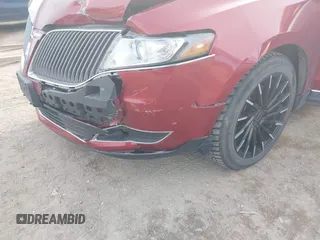2014 Lincoln MKT EcoBoost with VIN 2LMHJ5ATXEBL58430, listed as a IAAI auction lot 41657571 with 58,502 mi miles and . Bid and sale history available at DreamBid. Image 6.
