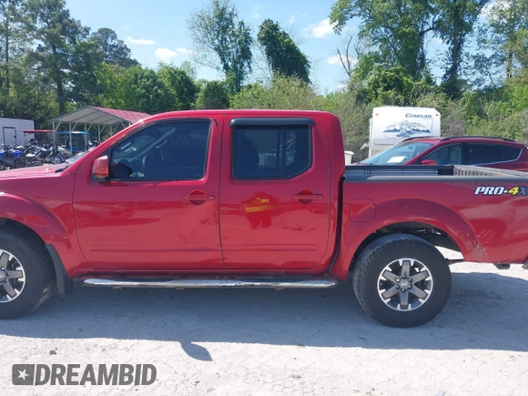 2014 Nissan Frontier S with VIN 1N6AD0EV3EN734085, listed as a IAAI auction lot 42007200 with Not provided miles and . Bid and sale history available at DreamBid. Image 13.
