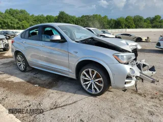 2017 BMW X4 M40i with VIN 5UXXW7C36H0U26510, listed as a Copart auction lot 62700515 with Not provided miles and Salvage title. Bid and sale history available at DreamBid. Image 4.