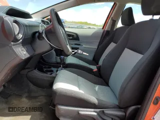 2012 Toyota Prius c One with VIN JTDKDTB35C1030051, listed as a Copart auction lot 52895065 with 94,529 mi miles and Salvage Title. Bid and sale history available at carsss.com. Image 7.