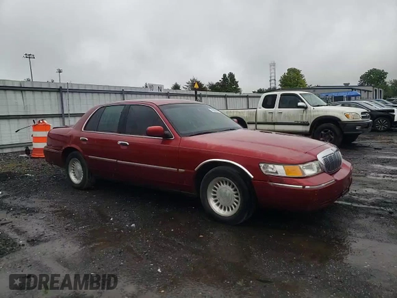 1999 Mercury Grand Marquis LS с VIN 2MEFM75W9XX701991, выставлен на аукционе Copart как лот 58388085 с пробегом 163 160 миль миль и Списание • Salvage title. История ставок и продаж доступна на DreamBid. Изображение 13.