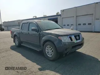 2014 Nissan Frontier SV with VIN 1N6AD0EV9EN710020, listed as a Copart auction lot 60895575 with 125,090 mi miles and Salvage title. Bid and sale history available at DreamBid. Image 13.