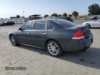 2014 Chevrolet Impala LTZ with VIN 2G1WC5E35E1106319, listed as a Copart auction lot 59260365 with 139,722 mi miles and Salvage title. Bid and sale history available at DreamBid. Image 2.