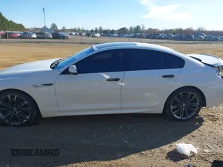 2015 BMW 6 Series 650i with VIN WBA6B2C54FGB99173, listed as a IAAI auction lot 41692594 with 123,664 mi miles and . Bid and sale history available at carsss.com. Image 15.