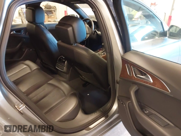 2014 Audi A6 Premium Plus with VIN WAUGFAFCXEN085327, listed as a IAAI auction lot 42094205 with 97,389 mi miles and . Bid and sale history available at DreamBid. Image 8.