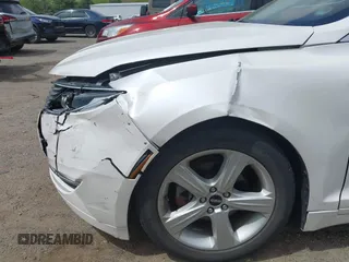 2015 Lincoln MKZ Hybrid with VIN 3LN6L2LU6FR605723, listed as a IAAI auction lot 42246269 with 121,942 mi miles and . Bid and sale history available at DreamBid. Image 12.