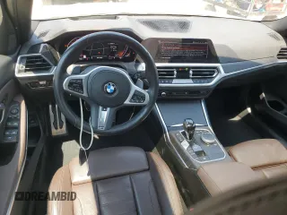 2022 BMW 3 Series 330i with VIN 3MW5R1J06N8C31334, listed as a Copart auction lot 52724395 with 36,445 mi miles and Salvage Title. Bid and sale history available at carsss.com. Image 8.