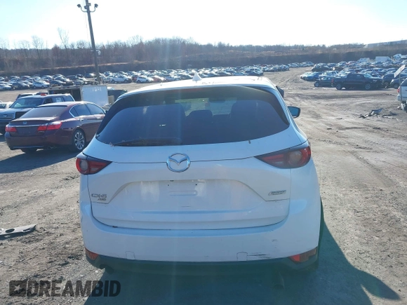 2017 Mazda CX-5 Grand Touring with VIN JM3KFBDL6H0188517, listed as a IAAI auction lot 41093178 with 98,831 mi miles. Bid and sale history available at carsss.com. Image 16.