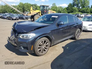 2020 BMW X4 xDrive30i z VIN 5UX2V1C0XL9C01742, wystawiony jako Copart lot #62100005 z przebiegiem 106 038 mil mil oraz Szkoda całkowita • Salvage title. Historia ofert i sprzedaży dostępna na DreamBid. Obrazek 1.