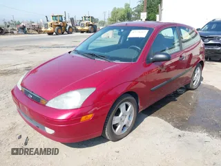 2003 Ford Focus ZX3 with VIN 3FAHP31323R119865, listed as a IAAI auction lot 42738163 with 64,008 mi miles and . Bid and sale history available at DreamBid. Image 2.