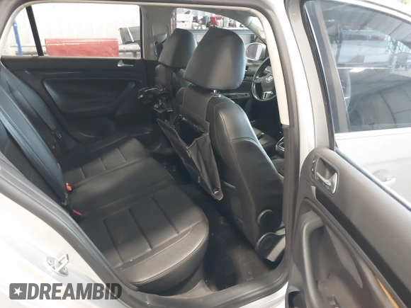 2012 Volkswagen Jetta TDI with VIN 3VWML7AJ4CM668312, listed as a IAAI auction lot 41998809 with 130,866 mi miles and . Bid and sale history available at DreamBid. Image 8.
