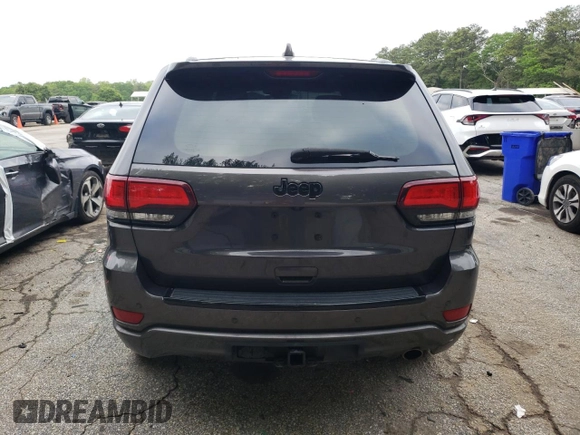 2018 Jeep Grand Cherokee Altitude with VIN 1C4RJEAG0JC208506, listed as a Copart auction lot 52669915 with 159,299 mi miles and Salvage title. Bid and sale history available at DreamBid. Image 6.