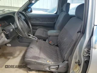 2000 Nissan Frontier XE with VIN 1N6ED27T8YC367452, listed as a Copart auction lot 55866345 with 242,945 mi miles and Salvage title. Bid and sale history available at DreamBid. Image 7.