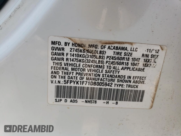 2013 Honda Ridgeline Sport with VIN 5FPYK1F71DB005942, listed as a Copart auction lot 53693385 with 182,385 mi miles and Salvage title. Bid and sale history available at DreamBid. Image 12.