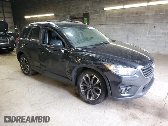 2016 Mazda CX-5 Grand Touring with VIN JM3KE4DY3G0859067, listed as a Copart auction lot 49759775 with 92,928 mi miles and Salvage Title. Bid and sale history available at carsss.com. Image 4.